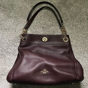 Dark burgundy Coach leather handbag